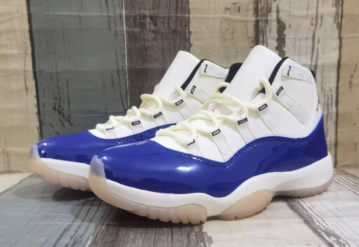Air Jordan 11 Retro High-Top Sneakers – White, Blue & Red